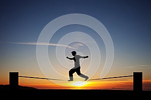 Slackliner in sunset