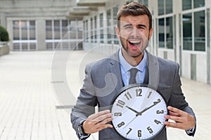 Slammed worker holding the time