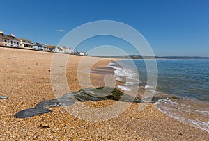 Slapton Sands beach Devon with clear blue sea and sand photo