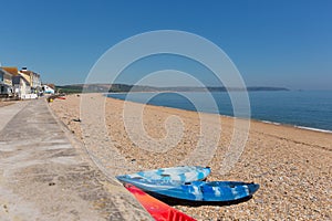 Slapton Sands beach Devon England UK, from Torcross in direction of Dartmouth with canoes