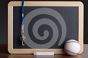 Slate with baseball; chalk and whistle