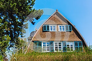 Slate tiled gable of a rainbow roofed house in Darmstadt