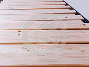 Slats wooden beds close up