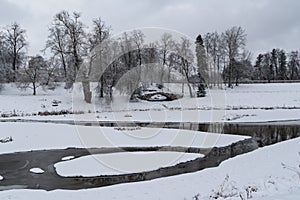 Slavyanka river and Cascade winter view in Pavlovsk palace park. Saint-Petersburg, Russia