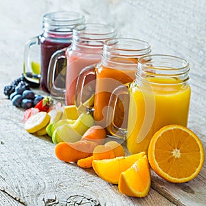 Slection of fresh fruit juices in jars