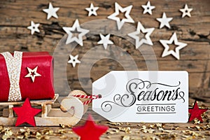 Sled With Gift, Christmas Background With Text Seasons Greetings