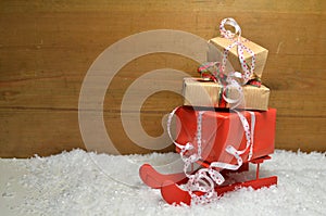 Sled and Gifts in Snow Christmas