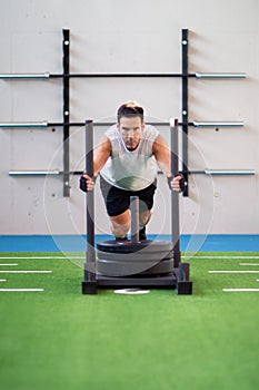 Sled pushing in the gym