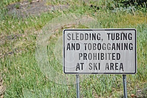 Sledding, Tubing and tobogganing Prohibited at Ski Area Sign on the Arizona Snowbowl Ski Resort, Mount Humphreys. Flagstaff, Arizo