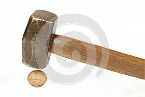 Sledge hammer and walnut