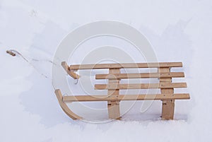 Sledge in snow in frosty frame