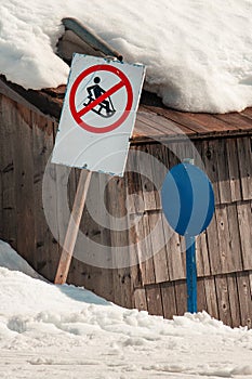 Sledging is forbidden sign in ski resort