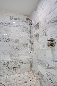 Sleek bathroom with large walk in shower