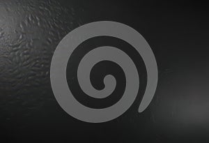 Sleek black leather, smooth surface, subtle texture , detail, dark