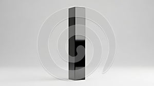 A sleek black rectangular object on a plain background