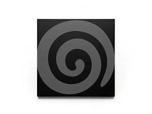 A sleek black rectangular object with a smooth and polished surface