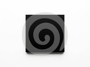 A sleek black rectangular object with a smooth surface and rounded edges