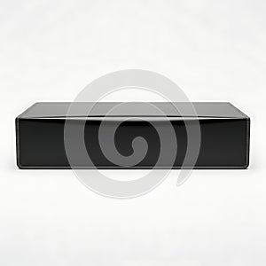 Sleek modern black rectangular electronic device on a plain background