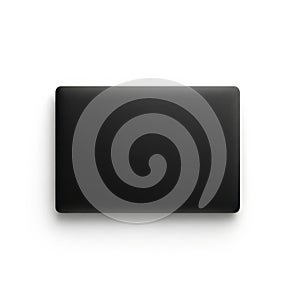 Modern black rectangle object with subtle reflection on clean surface