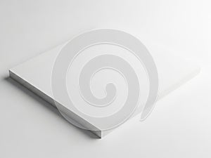 A sleek and modern white rectangular object with a smooth surface and a slight shadow
