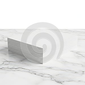 A sleek, modern white rectangular object with a textured surface on a white marble background