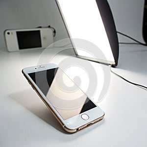 Phone with light isolated on white background