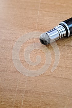 Sleek touch pen for digital devices close-up on modern surface