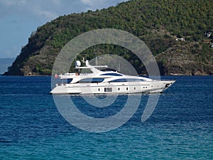 A sleek yacht at anchor in admiralty bay.