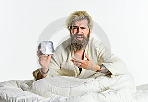 Sleep complex biological process that helps process new information, stay healthy and feel rested. Stressed man alarm