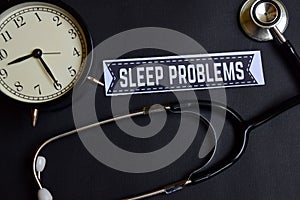 Sleep Problems on the paper with Healthcare Concept Inspiration. alarm clock, Black stethoscope.