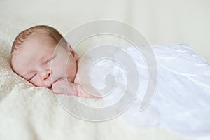 Sleeping angelic newborn