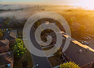 The sleeping area with apartment buildings aerial view of beautiful of the river a height with fog morning of river