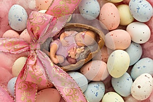 Sleeping baby in easter egg