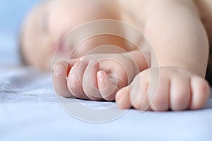 Sleeping baby finger