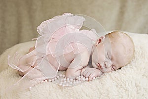 Sleeping Baby Girl with Bow