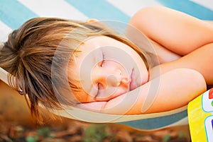 Sleeping baby in the hammock