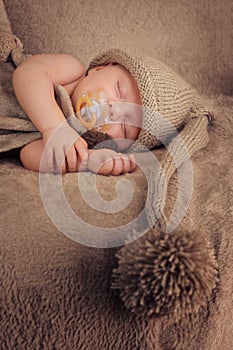 Sleeping baby with pacifier