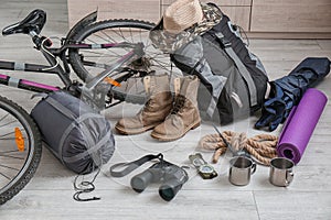 Sleeping bag, bicycle and set of camping equipment