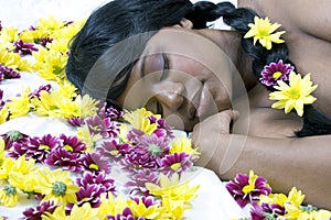 Sleeping beauty in a bed of flowers