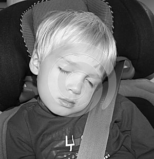 Sleeping Boy in Car Seat