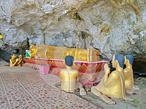 Sleeping Buddha sculpture in the cave , Travel in Vang Viang Cit