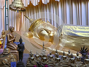 Sleeping buddha statue at Trang, Thailand