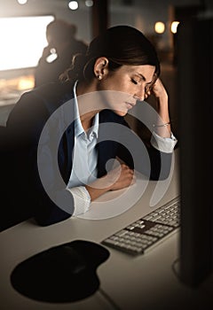 Sleeping, burnout or tired businesswoman by computer overwhelmed by deadlines with fatigue at desk. Lazy worker, night