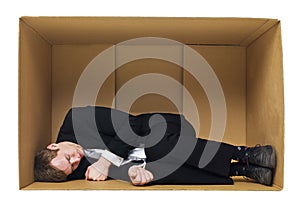 Sleeping in a cardboard box