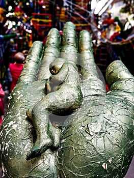 Sleeping child on palmtop a decorative art at Hindustan park durga puja