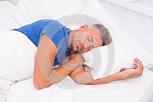 Sleeping guy at home. Relaxed man. Promote prevention and management of sleep disorders. World Sleep Day. Benefits of