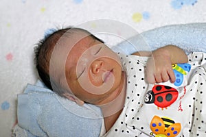 Sleeping Japanese newborn baby