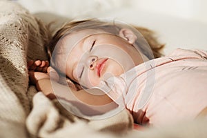 Sleeping little girl. Carefree sleep little baby with a soft toy