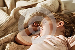 Sleeping little girl. Carefree sleep little baby with a soft toy