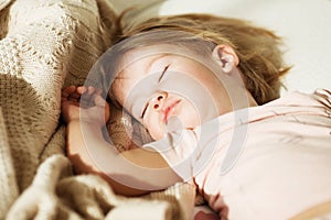 Sleeping little girl. Carefree sleep little baby with a soft toy